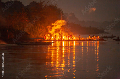 The festival of the illuminated boat procession on Mekong River. photo