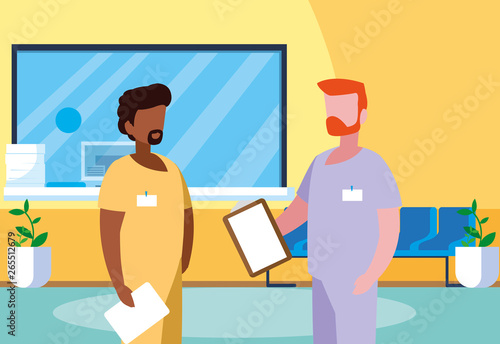 interracial male medicine workers in clinic reception