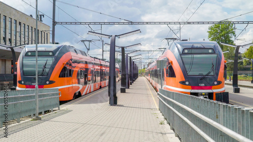 19971_Two_orange_train_on_the_railway_stations_in_the_city29.jpg
