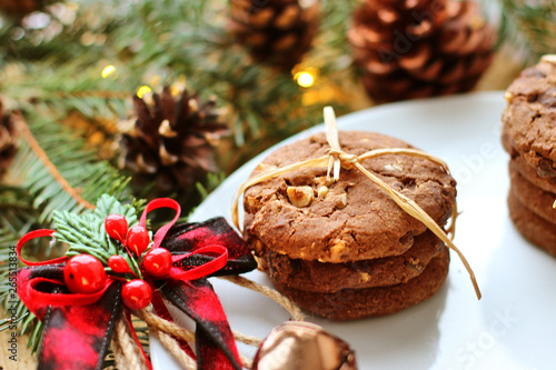 Christmas decorations - oat biscuits for Santa Claus and branches of coniferous trees