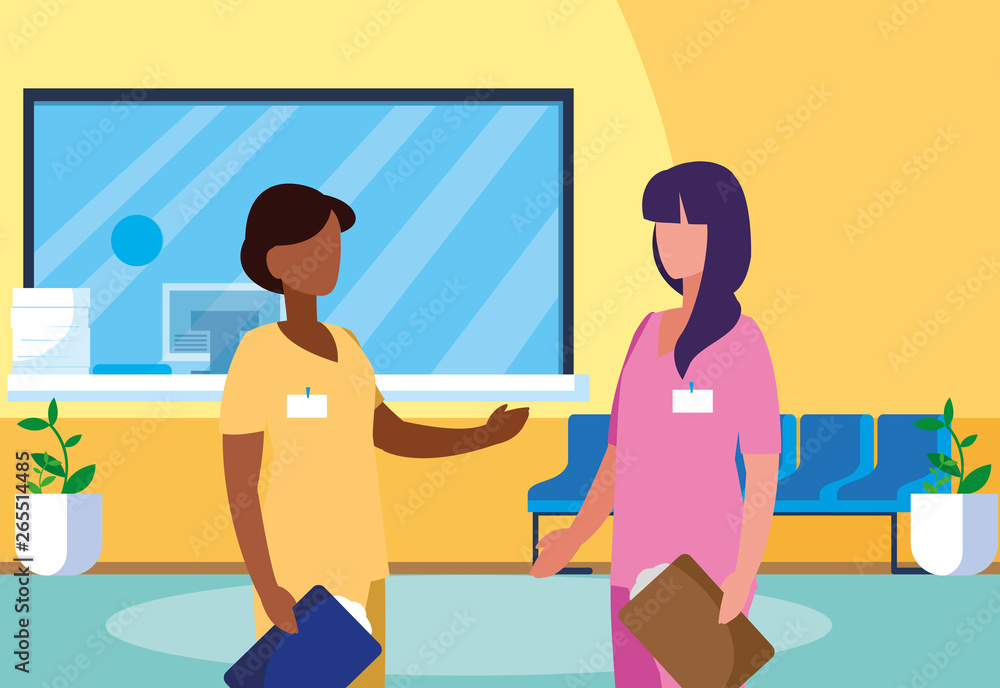 interracial female medicine workers in clinic reception interracial female medicine workers in clinic reception