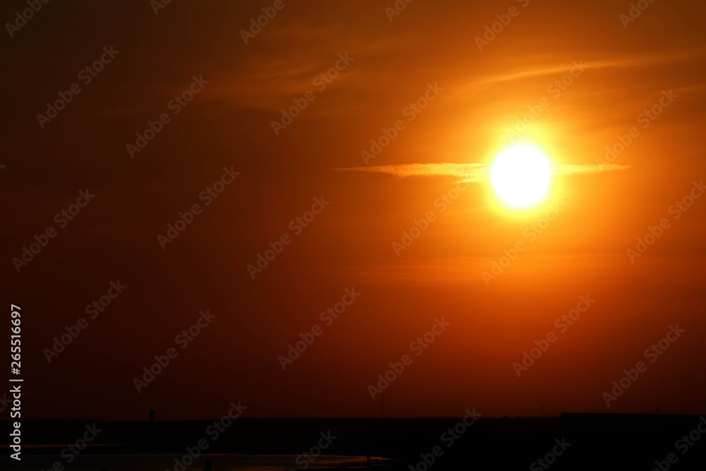 Orange sunset sun over the baltic sea wallpaper