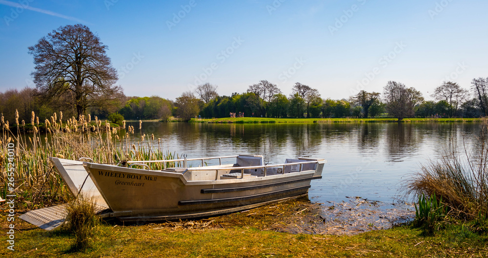 Whitchurch, Shropshire, England - 04/19/19: Landscape picture of Alderford lake, Whitchurch, North Shropshire, England, United Kingdom in spring on sunny day