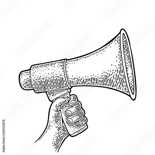 Male hand holding loudspeaker.