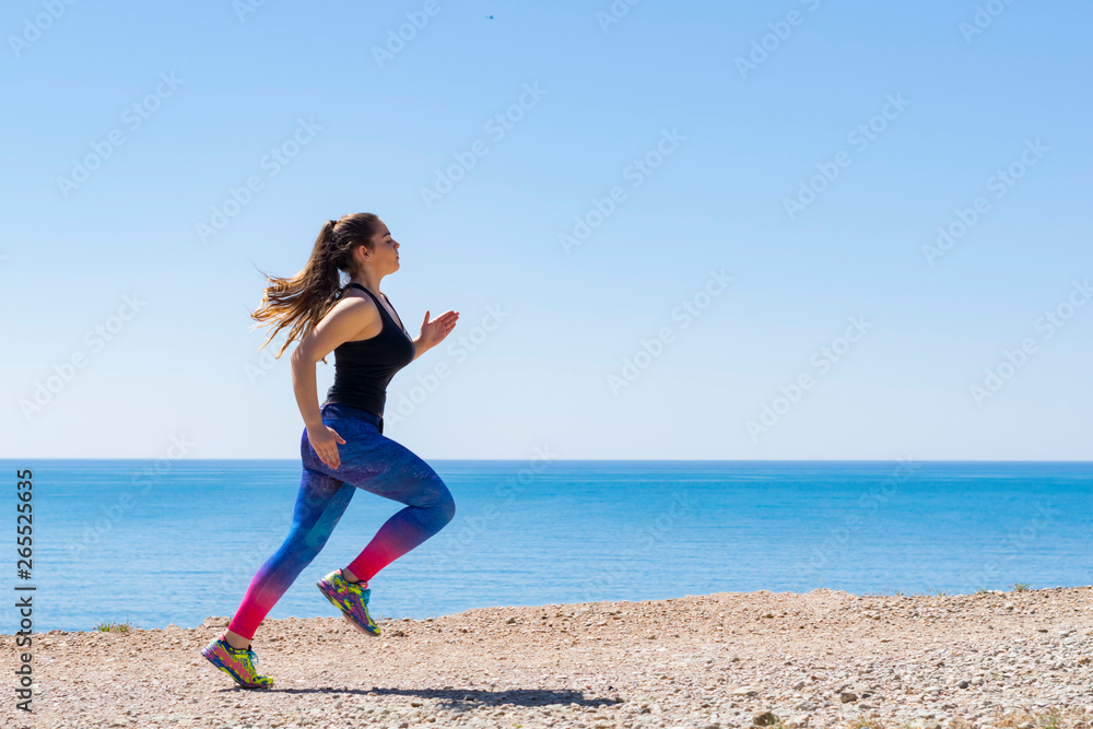 Attractive Woman Sprinting Outdoors Attractive Woman Sprinting Outdoors