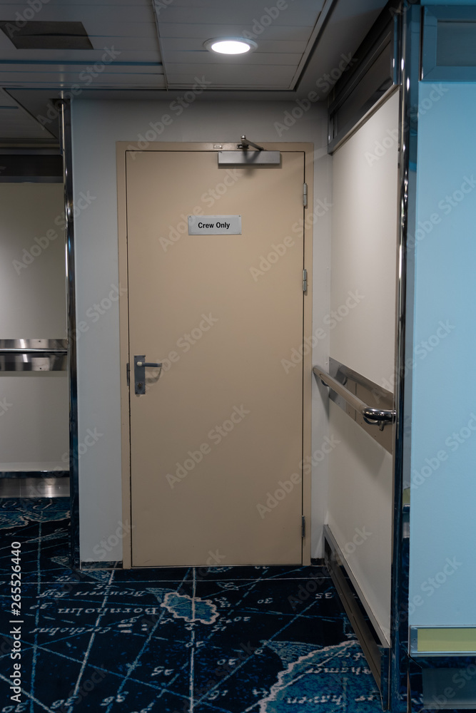 Door to a area with access only for the crew of the ship Door to a area with access only for the crew of the ship