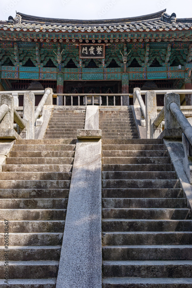 Bulguksa temple in Gyeongju, Korea. View of the famous stair case with Cheongungyo and Baegungyo the cloud bridge that brings you to enlightment.  Translation of letters: Jahamun, Gate of red sunset