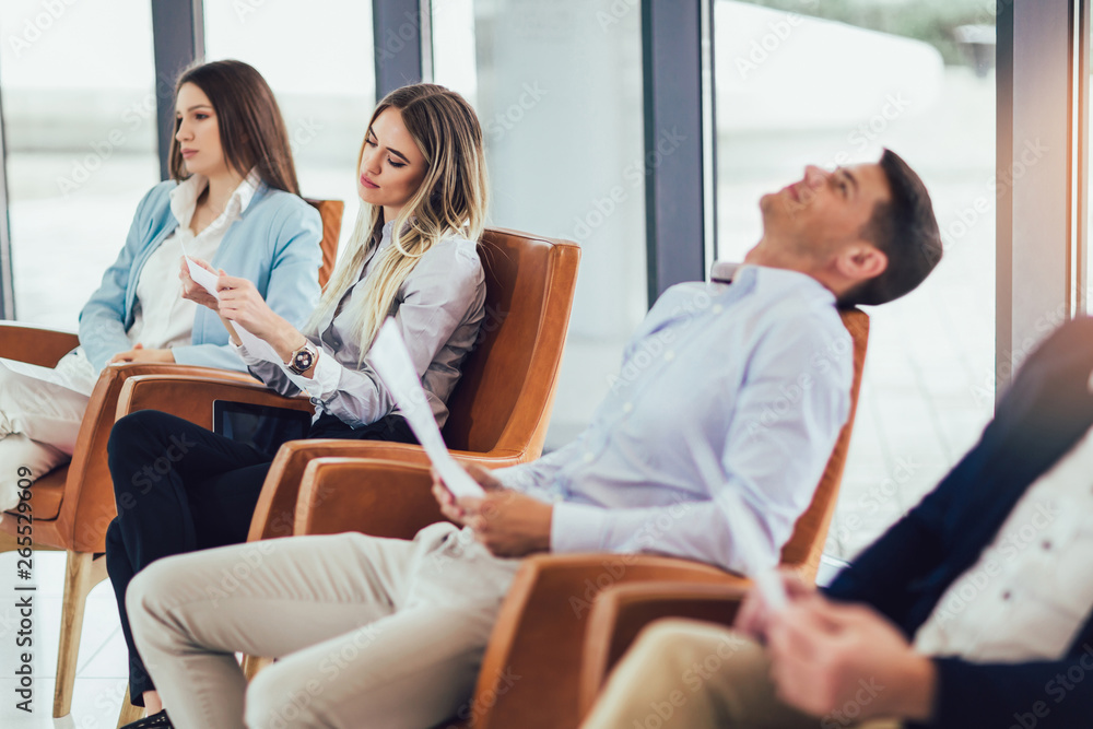 Photo of candidates waiting for a job interview. Photo of candidates waiting for a job interview.