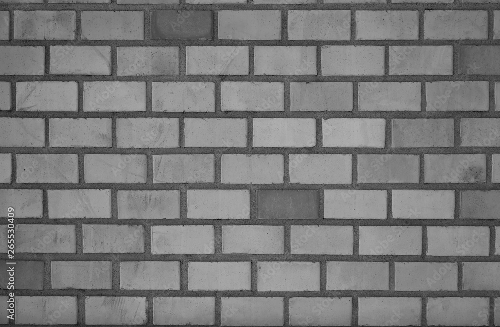 grey and white brick wall.