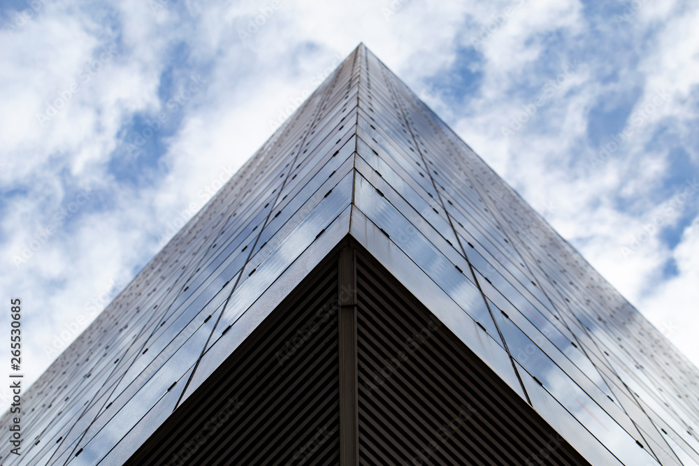 Clouds reflected in windows of modern office building. Clouds reflected in windows of modern office building.