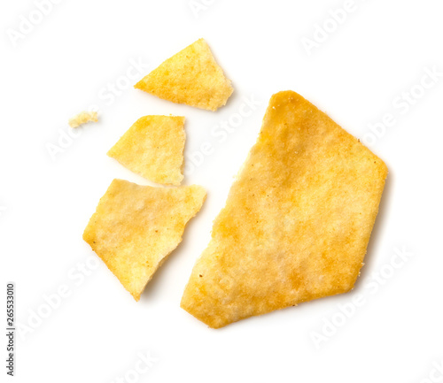 broken potato chips isolated on white background