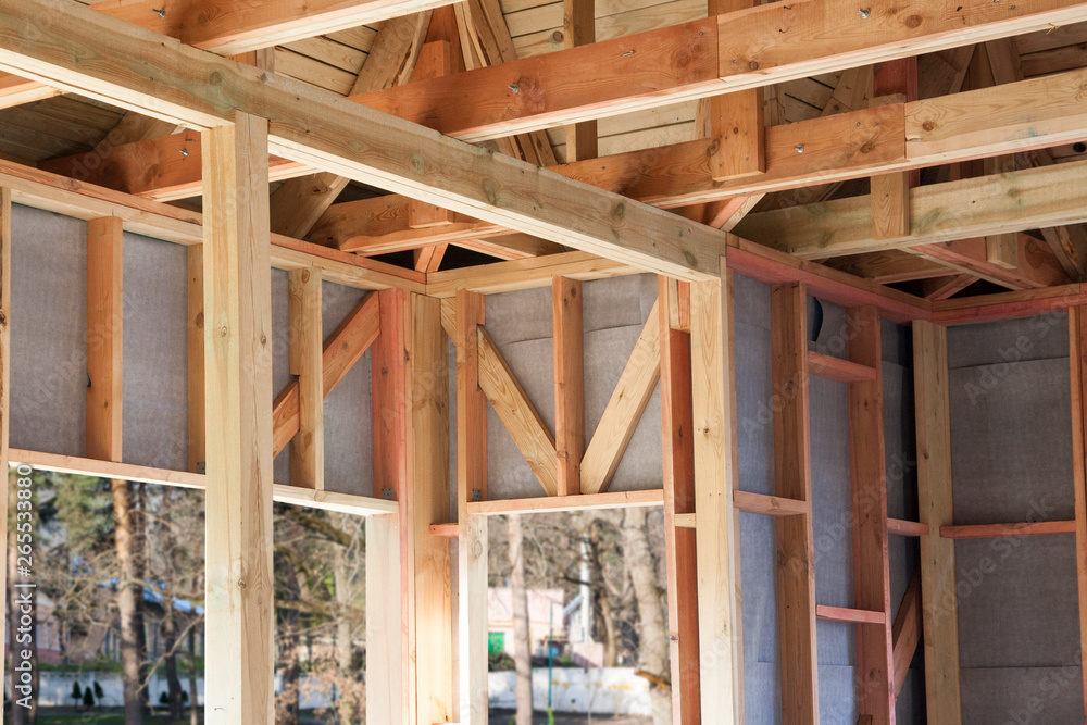 construction of a wooden house, the frame of wood - the walls construction of a wooden house, the frame of wood - the walls