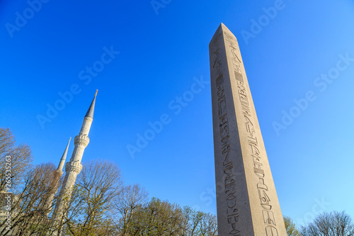 Egyptian obelisk in Istanbul. Ancient Egyptian obelisk of Pharaoh Tutmoses in Hippodrome square of Istanbul, Turkey photo