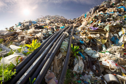 Collecting methane in the trash. photo