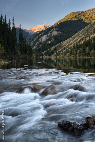 Rapids of Lower Kolsai Lake river at sunrise in the Kungey Alatau mountains Kazakhstan