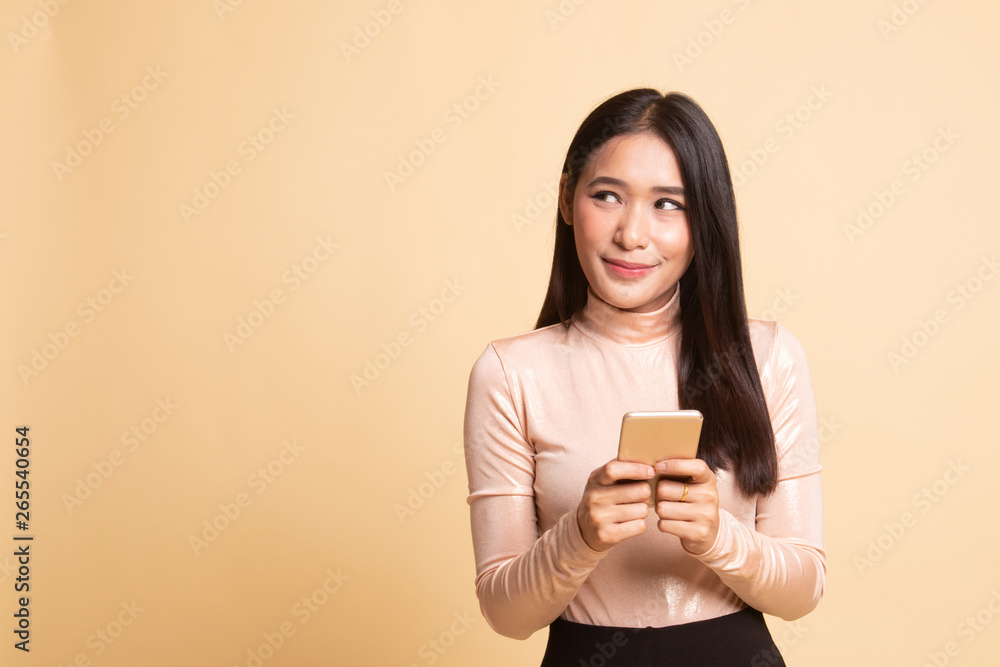 Young Asian woman with mobile phone. Young Asian woman with mobile phone.