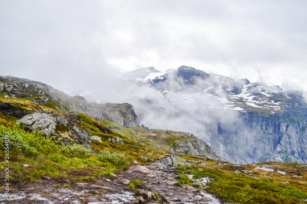 Trolltunga hike, Lake Ringedalsvatnet, Norway, Beautiful scandinavian landscape, Scandianavia, summer nature. Hike starts from Odda town