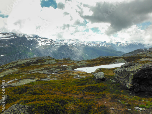 Trolltunga hike, Lake Ringedalsvatnet, Norway, Beautiful scandinavian landscape, Scandianavia, summer nature. Hike starts from Odda town photo