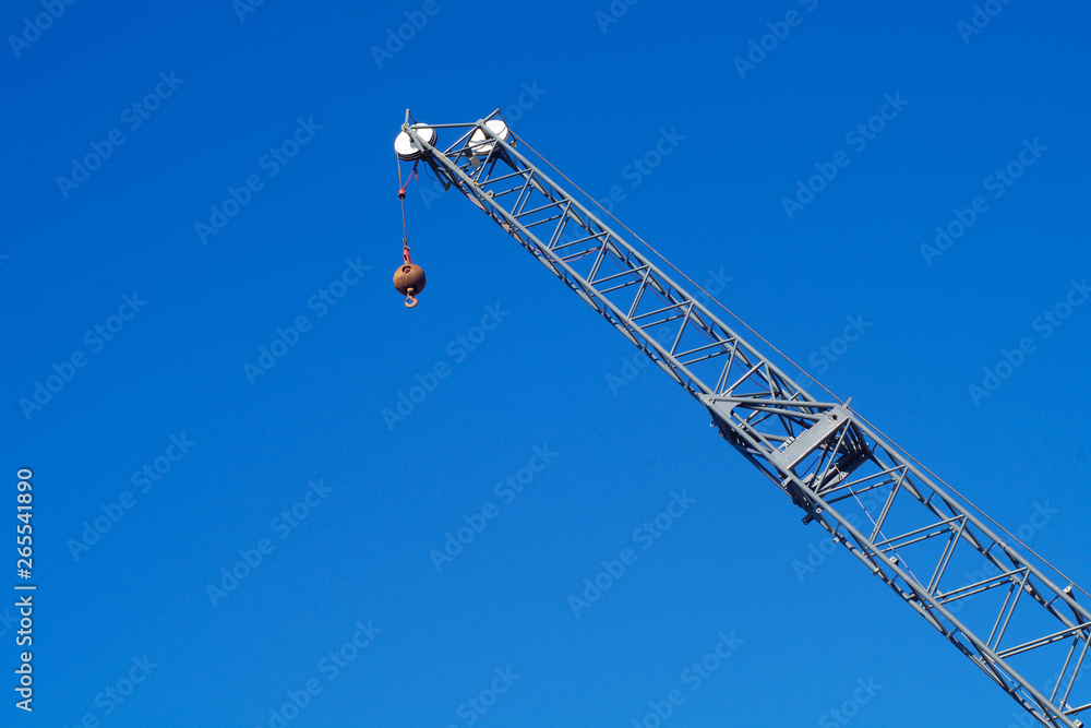 crane on blue sky hook lifting equipment construction industry Stock Photo