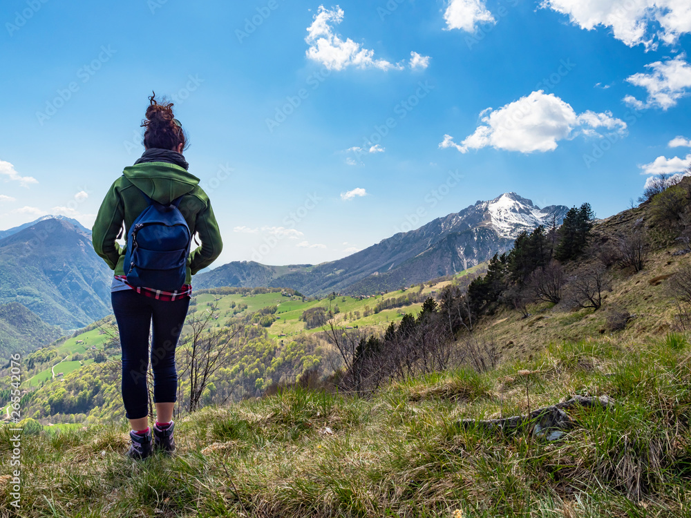 Backpacker woman in the alps