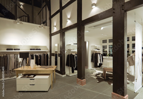 Clothes for sale in modern store photo