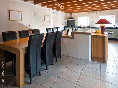 Chairs at empty kitchen table