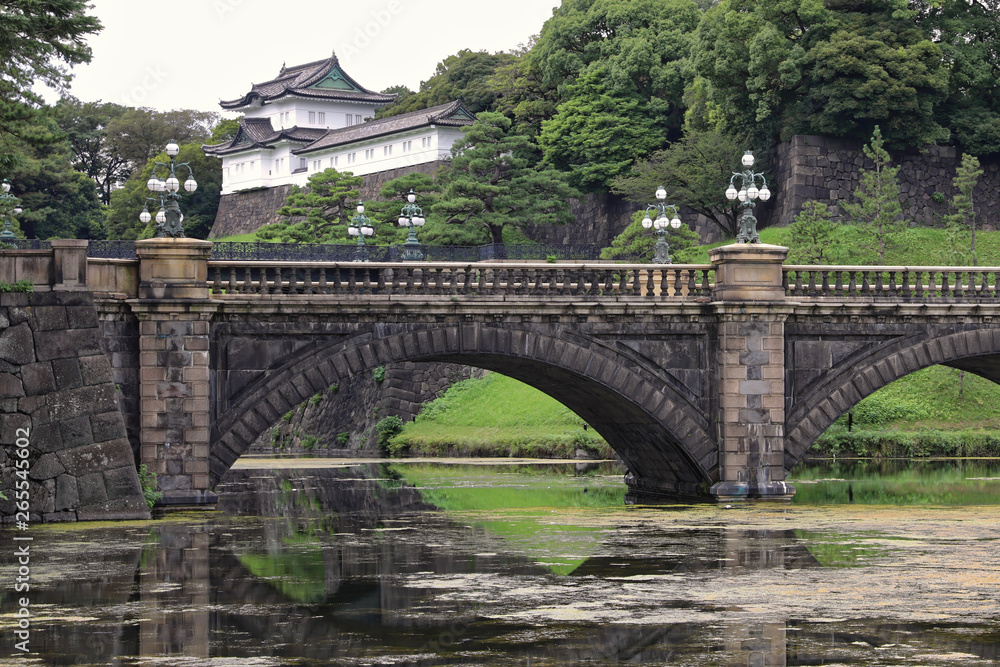 Tokyo, Japan - August 3, 2019: Tourists visit the Imperial Palace with Nijubashi Bridge in Tokyo Tokyo, Japan - August 3, 2019: Tourists visit the Imperial Palace with Nijubashi Bridge in Tokyo