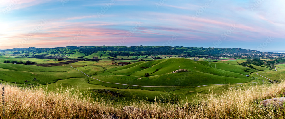 Panorama field of Pasture and Hills at Sunrise