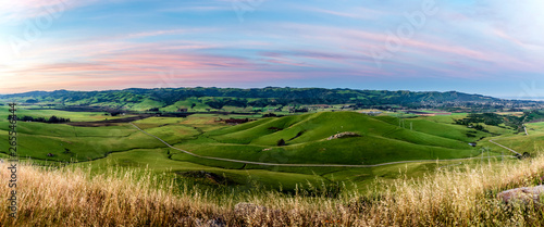 Panorama field of Pasture and Hills at Sunrise