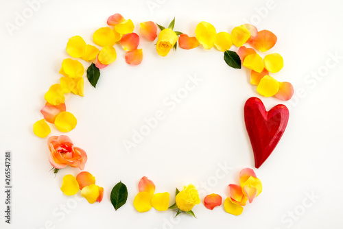 Red heart and rose petals frame