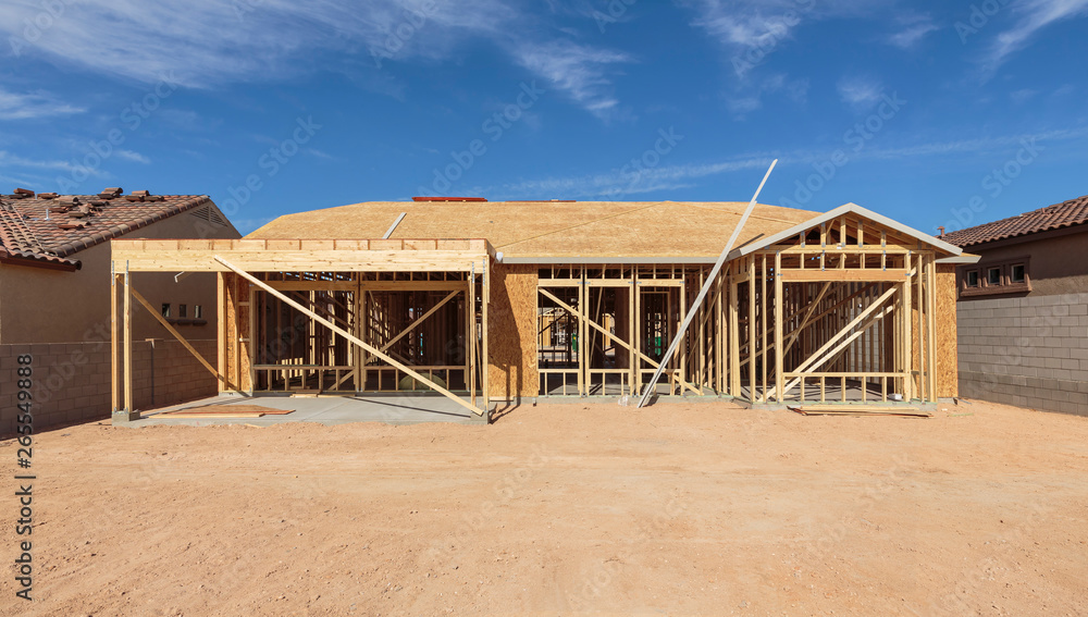 Construction of house under blue sky Construction of house under blue sky