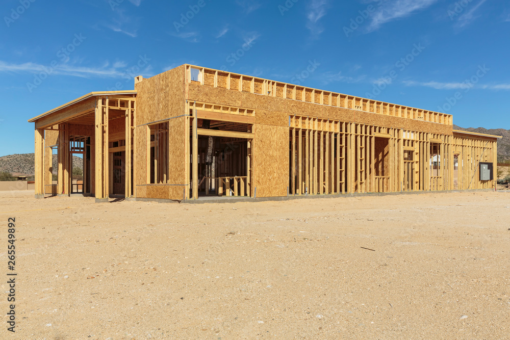 Construction of house under blue sky Construction of house under blue sky