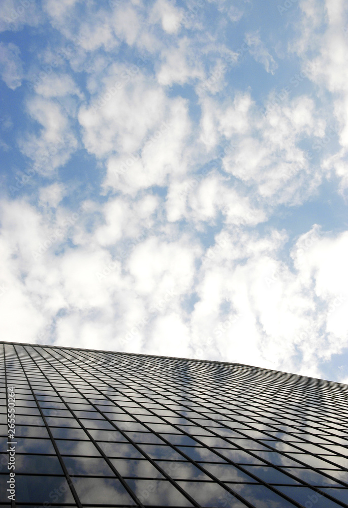 Reflection of clouds on highrise window Reflection of clouds on highrise window