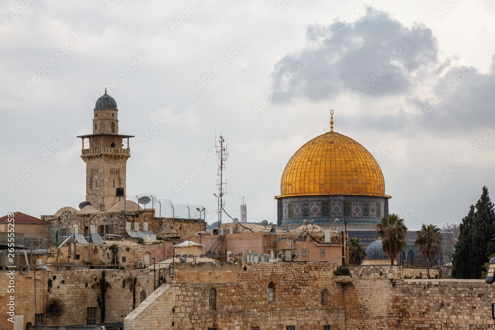 View of the Dome of the Rock and the Western Wall in the Old City during a cloudy day. Taken in Jerusalem, Israel.