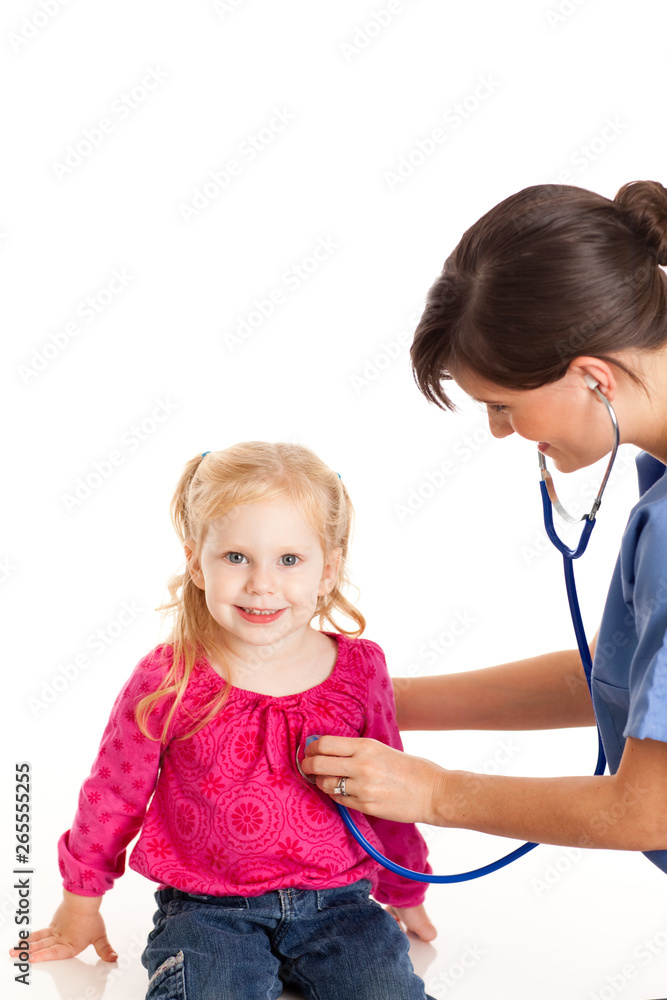 Happy Nurse Examining a Little Girl - Medical Healthcare Happy Nurse Examining a Little Girl - Medical Healthcare