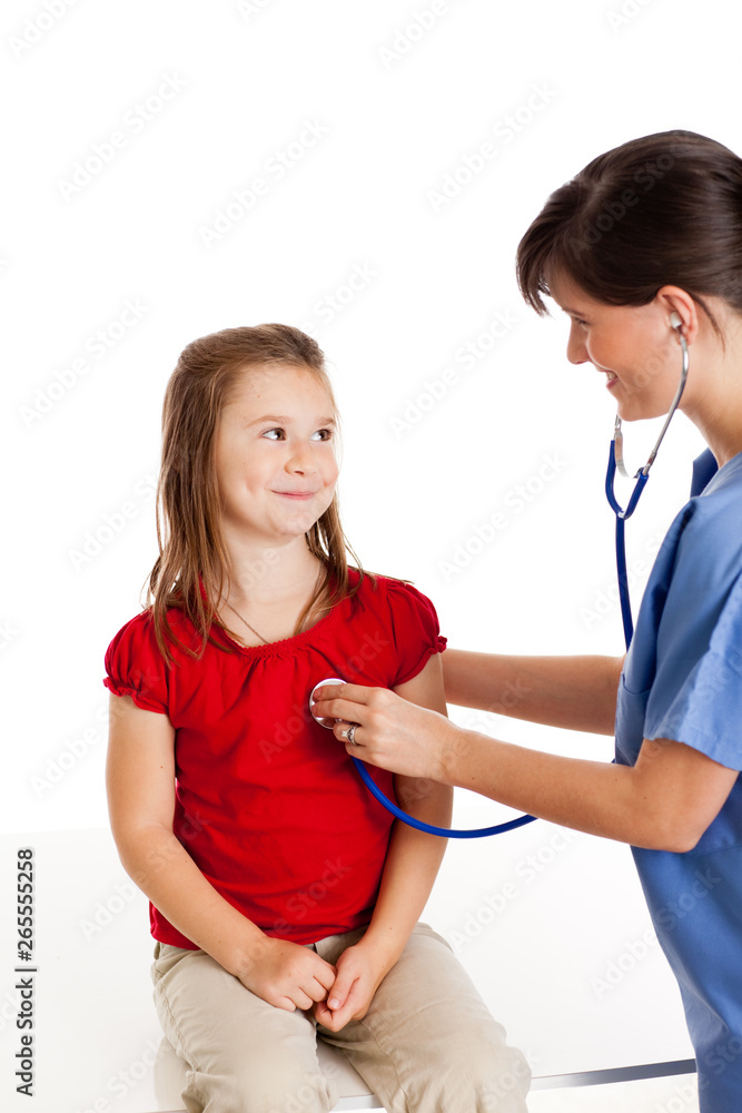 Happy Nurse Examining a Little Girl - Medical Healthcare Happy Nurse Examining a Little Girl - Medical Healthcare