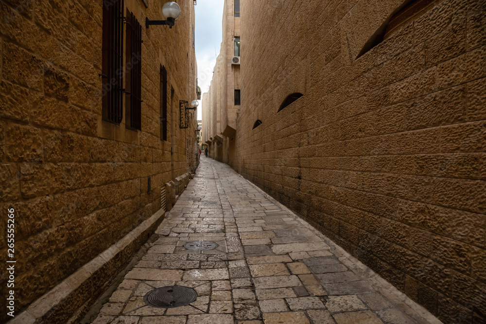Street view of the Ancient Old City during a cloudy day. Taken in Jerusalem, Israel.