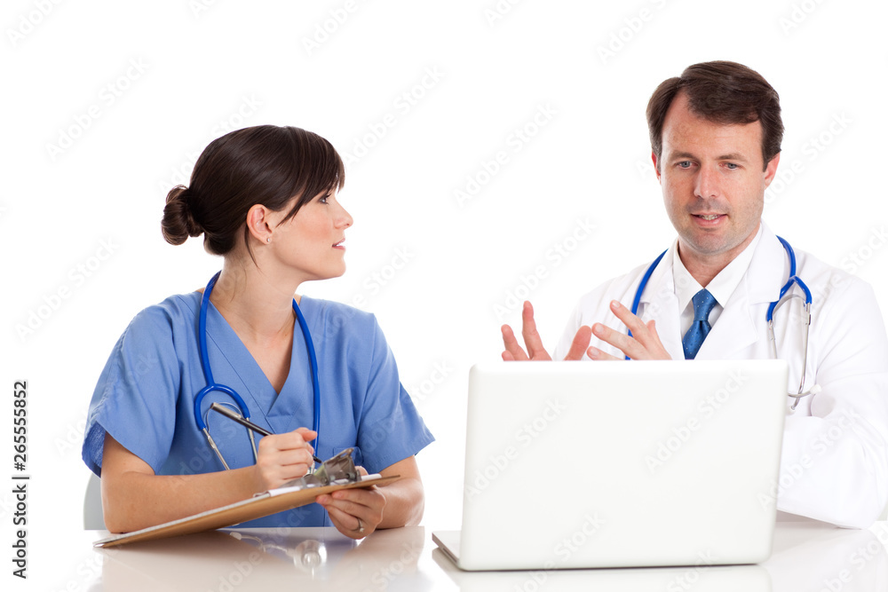 Happy Doctor and Nurse with Laptop Computer - Medical Healthcare