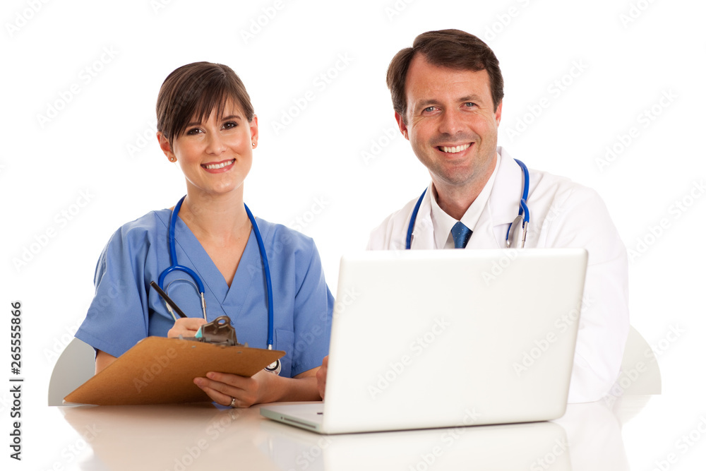 Happy Doctor and Nurse with Laptop Computer - Medical Healthcare Happy Doctor and Nurse with Laptop Computer - Medical Healthcare