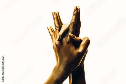 Image of woman hand in shakya muni hat mudra. Gesture is isolated on white background. photo