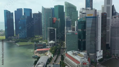 sunny singapore city downtown marina traffic bay famous hotel aerial panorama 4k  photo