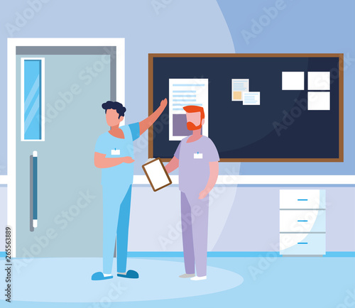 male medicine workers with uniforms in hospital corridor