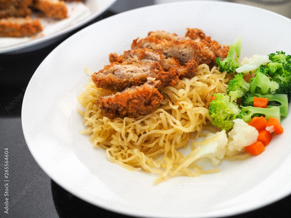 Egg noodles with fried chicken and vegetables Egg noodles with fried chicken and vegetables