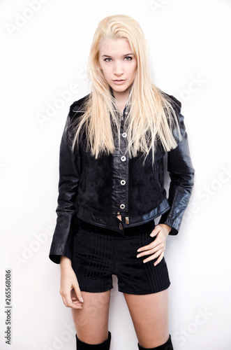 Beautiful isolated green eyed blonde lady looking at camera