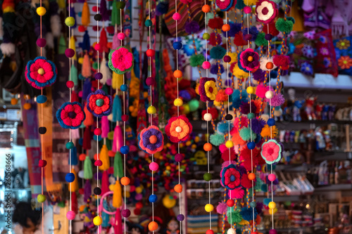 Colorful peruvian and andean handmade (handcraft) textile and woolen goods with traditional design for sale at Indian Market Miraflores, Lima