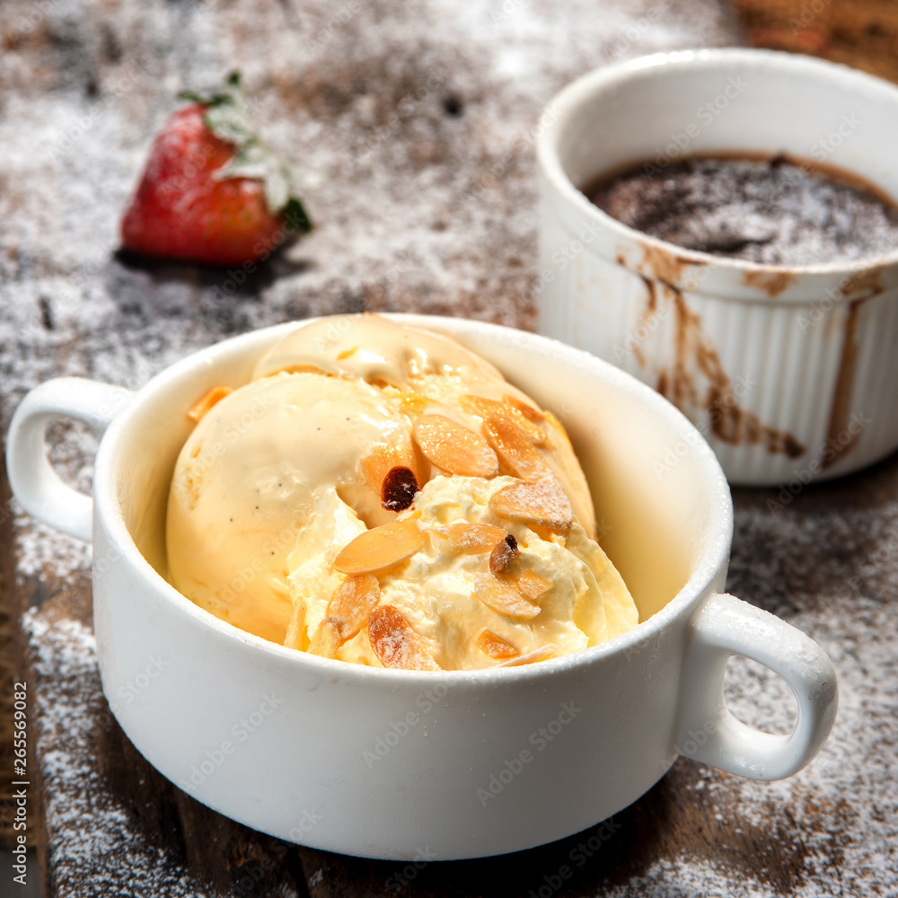 vanila ice cream in white cup with hot chocolate vanila ice cream in white cup with hot chocolate