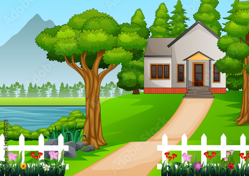 little house in beautiful village with green yard full of flowers