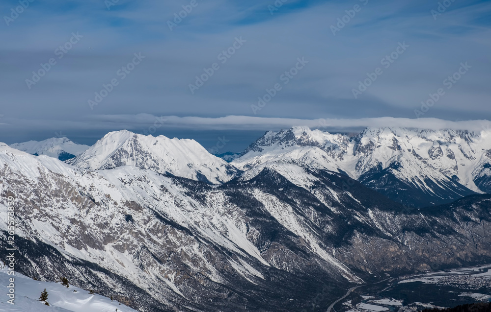 Winter panorama of mountains in Pitztal Hoch Zeiger ski resort in Austria Alps. Ski slopes. Beautiful winter day.