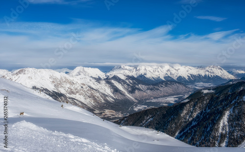 Winter panorama of mountains in Pitztal Hoch Zeiger ski resort in Austria Alps. Ski slopes. Beautiful winter day.