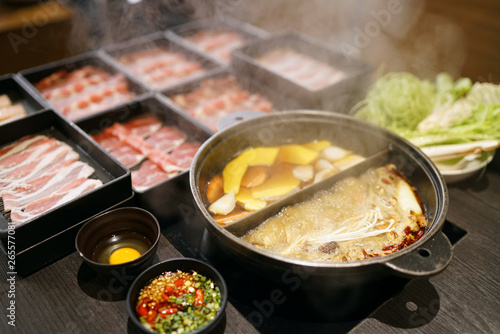 Thinly sliced of raw pork for hot pot also known as Shabu Shabu or Sukiyaki, Traditional Japanese food.